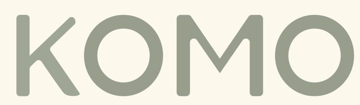KOMO WELLNESS BUSINESS COMPANY LIMITED logo